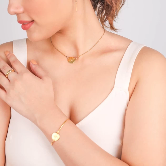 Celeste gold necklace -...