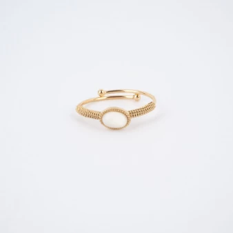 Oval stone pearly gold ring...