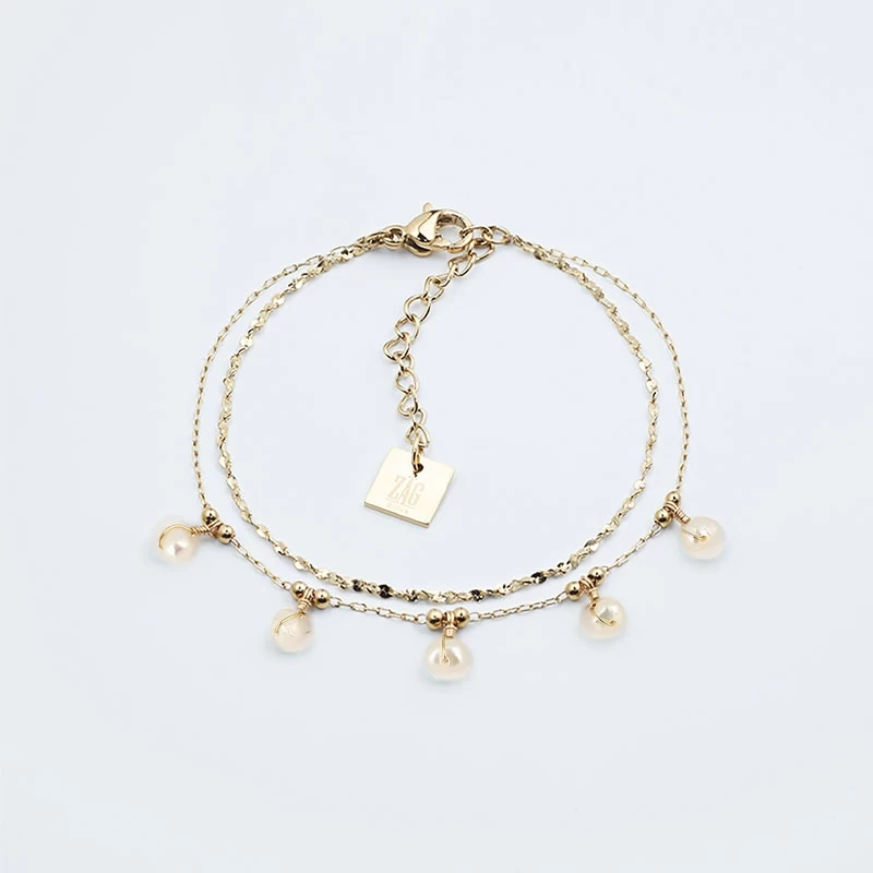 Bracelet perle blanche en acier jaune - Zag Bijoux