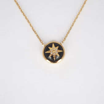 Black star necklace in gold...